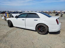 Rear wheel-corner auction view of the 2013 Chrysler 300 SRT8 for the rear knuckle reservation