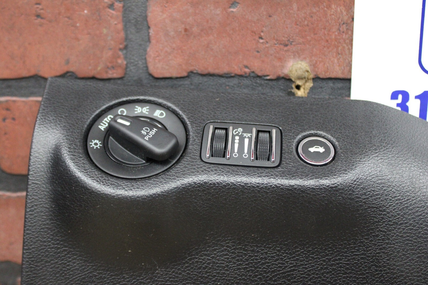 2015-2023 CHALLENGER STEERING COLUMN BOTTOM KNEE COVER TRIM PANEL HEADLIGHT OEM