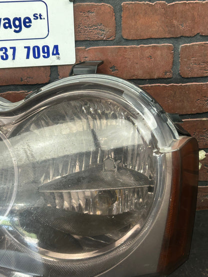 2005-2007 Jeep Grand Cherokee SRT8 Driver Left Headlight Assembly OEM