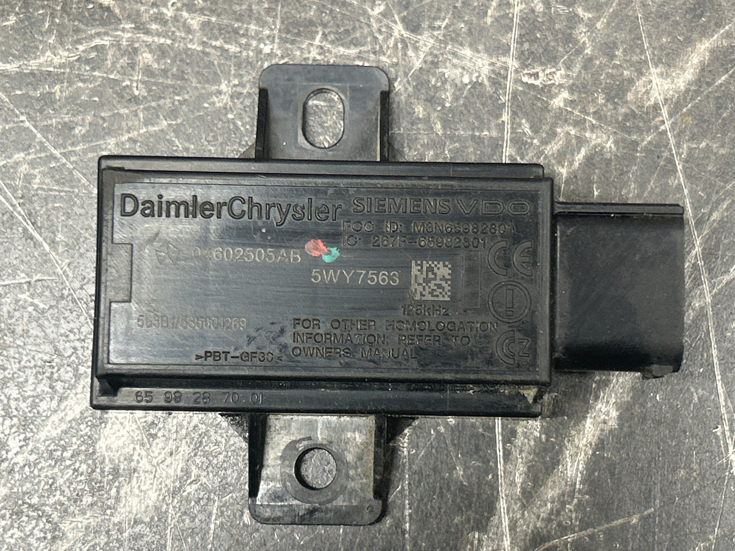 06-08 DODGE CHRYSLER LEFT FRONT TIRE PRESSURE TRANSPONDER TPMS OEM 4602503AB