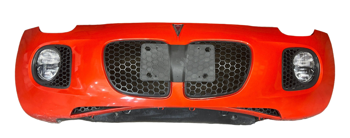 2007-2009 Pontiac Solstice GXP Front Bumper Cover w/ Lights Orange OEM