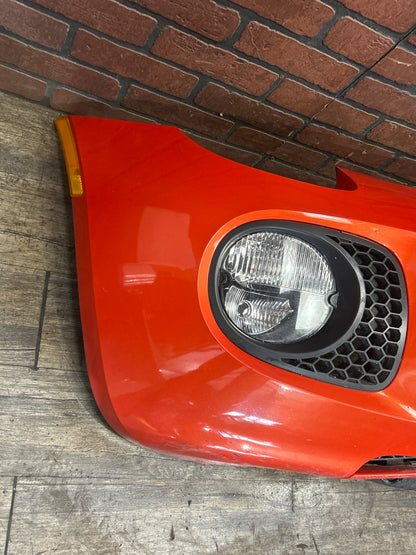 2007-2009 Pontiac Solstice GXP Front Bumper Cover w/ Lights Orange OEM