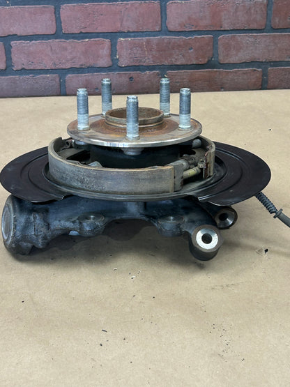 16-25 DURANGO GRAND CHEROKEE R/T OEM REAR RIGHT PASSENGER HUB SPINDLE KNUCKLE